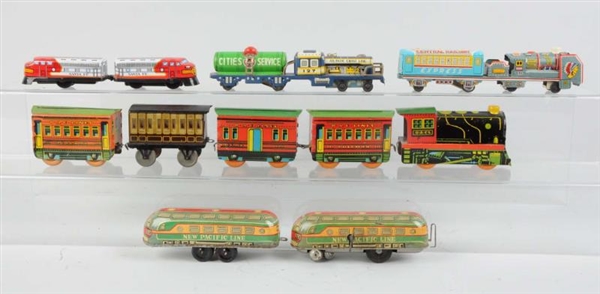 ASSORTED TIN LITHO TOY TRAINS MOSTLY JAPANESE.    
