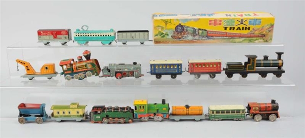 LOT OF 14: ASSORTED TIN LITHO TOY TRAINS.         