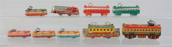 LOT OF 9: JAPANESE TIN TOY TRAINS.                