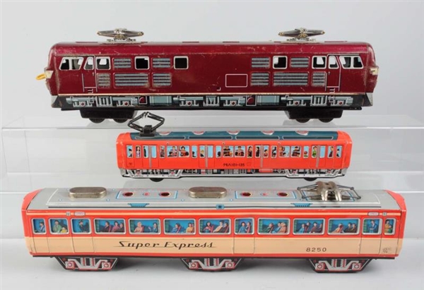 LOT OF 3: TIN LITHO TOY TRAINS.                   
