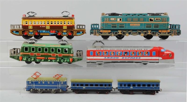 LOT OF 7: ASSORTED JAPANESE TIN LITHO TOY TRAINS. 