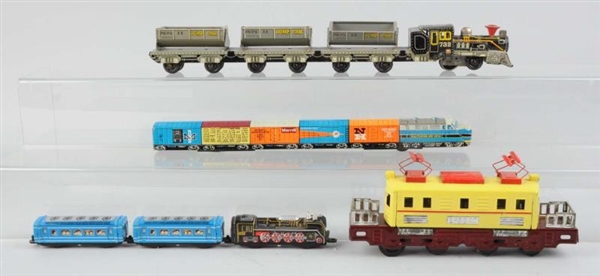 LOT OF 4: ASSORTED JAPANESE TIN LITHO TOY TRAINS. 