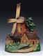 CAST IRON WINDMILL WITH TWO COTTAGES DOORSTOP.    