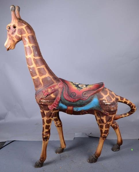 TALL PAINTED WOODEN GIRAFFE WITH SADDLE           