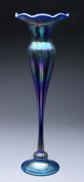 BLUE LUSTRE VASE WITH PULLED FEATHER DECOR.       
