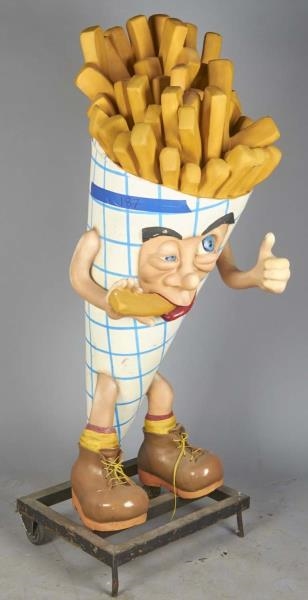 STANDING FRENCH FRY MAN EATING A FRY              