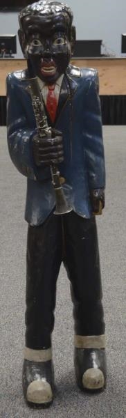AFRICAN AMERICAN CLARINET PLAYER STATUE           
