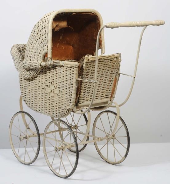 VINTAGE WICKER DOLL CARRIAGE.                     