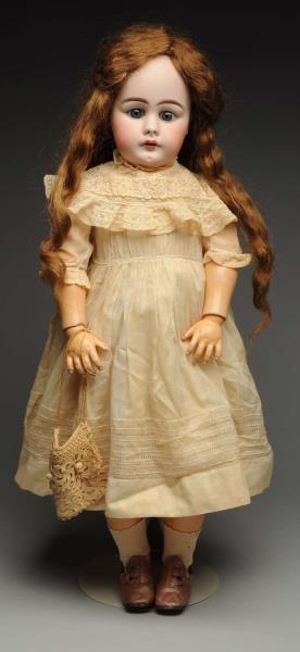 EARLY S & H CHILD DOLL.                           