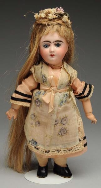 STRIKING FRENCH BISQUE DOLL.                      