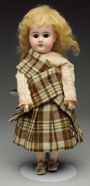 EARLY GERMAN CHILD DOLL.                          
