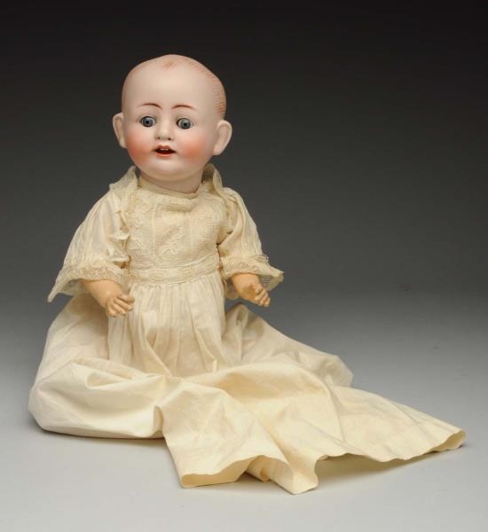 SMILING CHARACTER BABY DOLL.                      