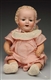 SMILING GERMAN CHARACTER BABY DOLL.               