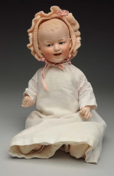 SMILING GEBR. HEUBACH CHARACTER BABY DOLL.        