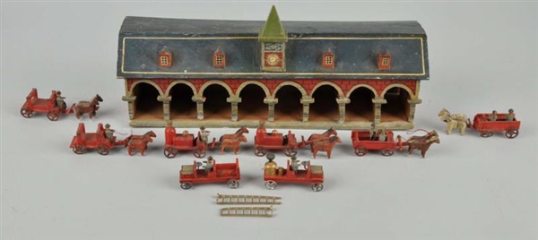 EARLY WOODEN FIREHOUSE WITH ACCESSORIES.          