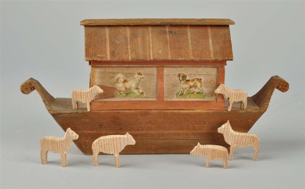 SMALL WOODEN TOY ARK WITH ANIMALS.                