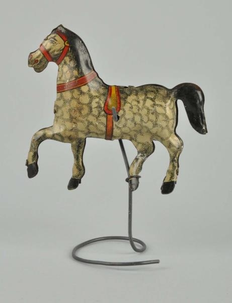 TIN LITHO PENNY TOY-SIZED HORSE ON STAND.         