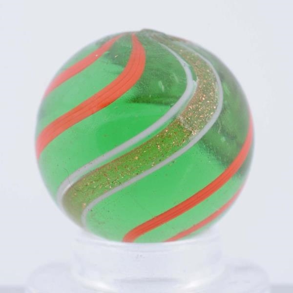 GREEN GLASS ORANGE BANDED LUTZ MARBLE.            