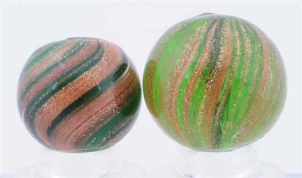 LOT OF 2: GREEN GLASS LUTZ MARBLES.               