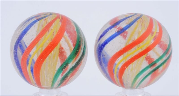 LOT OF 2: SAME CANE LARGE SWIRL MARBLES.          