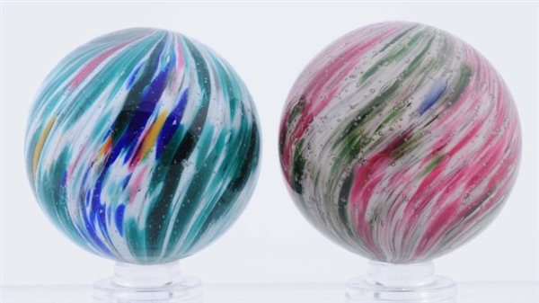 LOT OF 2: LARGE 4-PANEL ONIONSKIN MARBLES.        