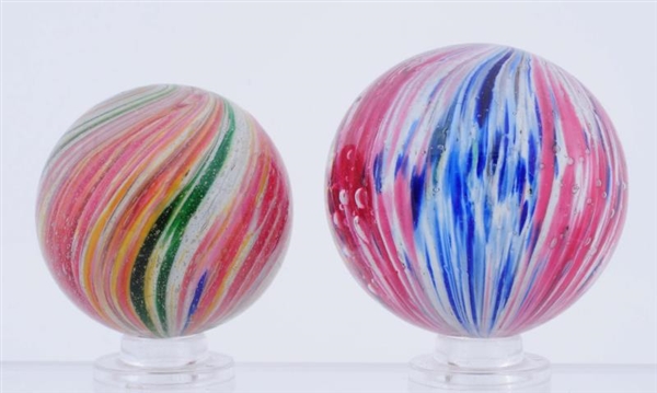 LOT OF 2: 4-PANEL ONIONSKIN MARBLES.              