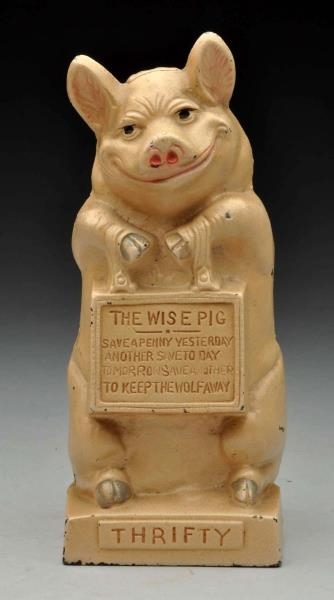 CAST IRON “THE WISE PIG” STILL BANK.              