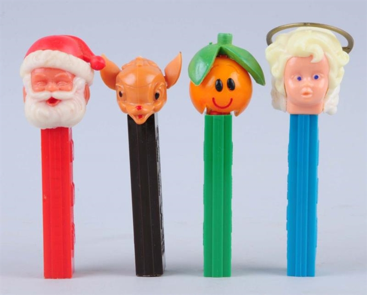 LOT OF 4: EARLY PEZ.                              