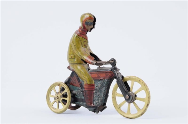 GERMAN TIN LITHO MOTORCYCLE PENNY TOY.            