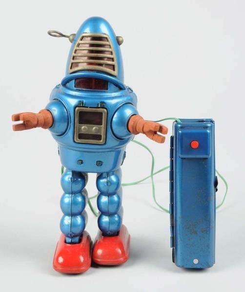 JAPANESE TIN LITHO BATTERY OPERATED PLANET ROBOT. 