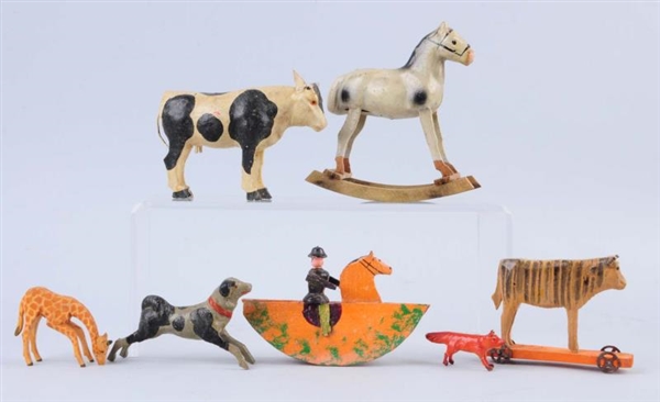 LOT OF 7: WOODEN ANIMALS.                         