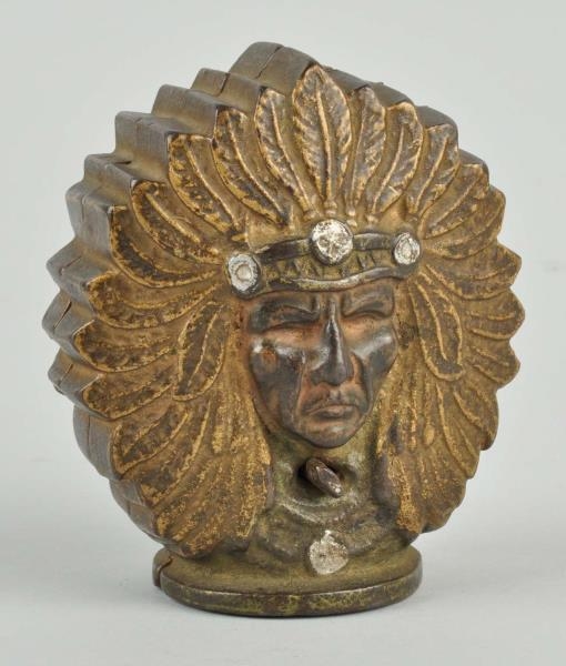 TWO-FACED INDIAN CAST IRON STILL BANK.            