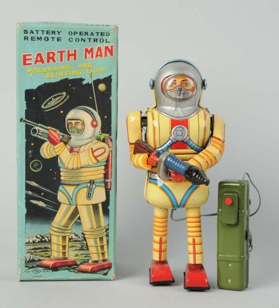 JAPANESE TIN LITHO BATTERY - OPERATED EARTH MAN.  