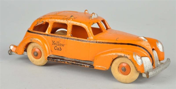 HUBLEY CAST IRON YELLOW CAB TOY.                  