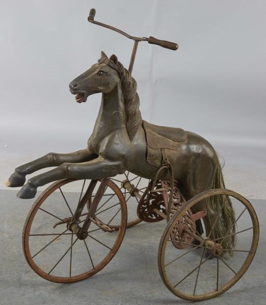 EARLY WOOD FIGURAL HORSE TRICYCLE                 