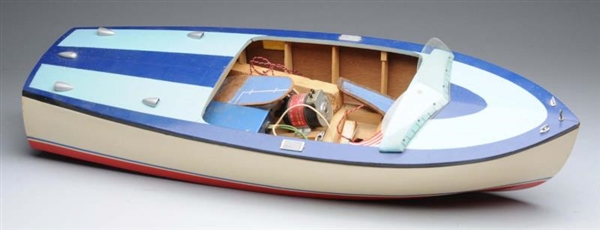 LARGE JAPANESE BATTERY-OPERATED MODEL BOAT.       
