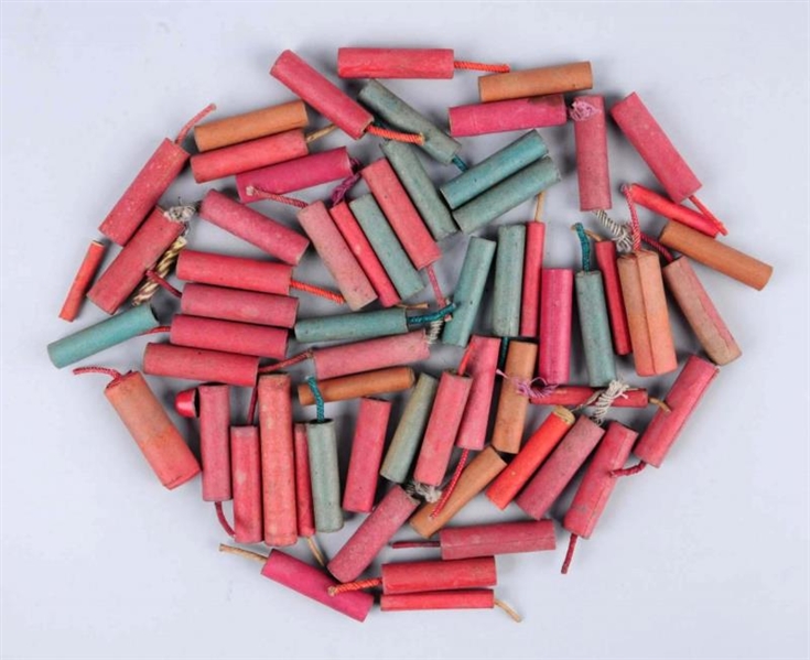LOT OF ASSORTED FIRECRACKERS - 50+ PIECES.        