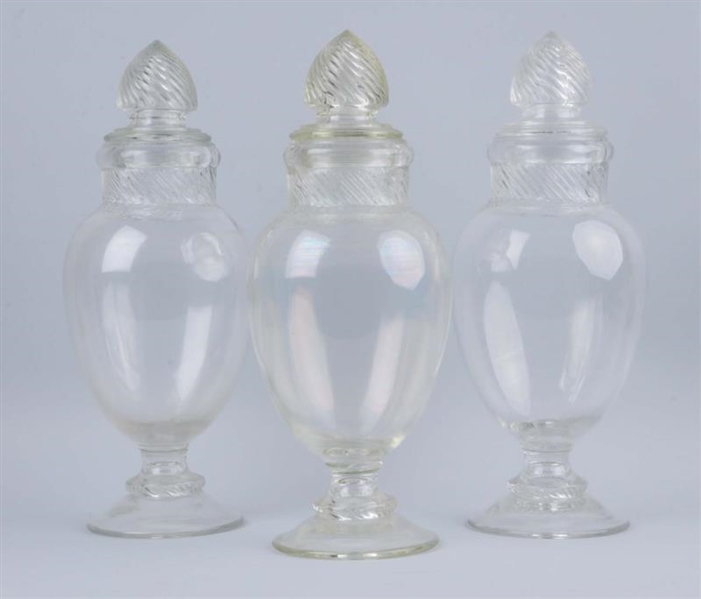 LOT OF 3: GLASS CANDY JARS.                       