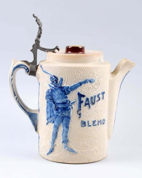 EARLY FAUST EMBOSSES STONEWARE PITCHER            