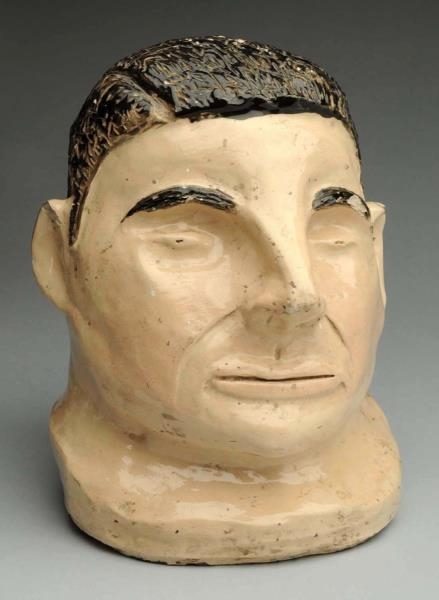 EARLY POTTERY BUST OF MANS HEAD.                 
