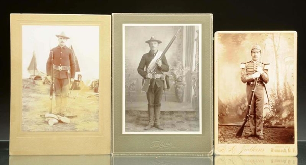LOT OF 3: PHOTOS OF SOLDIERS IN UNIFORM WITH GUNS 