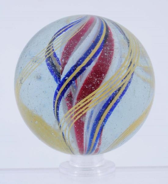 THREE STAGE DIVIDED CORE SWIRL MARBLE.            