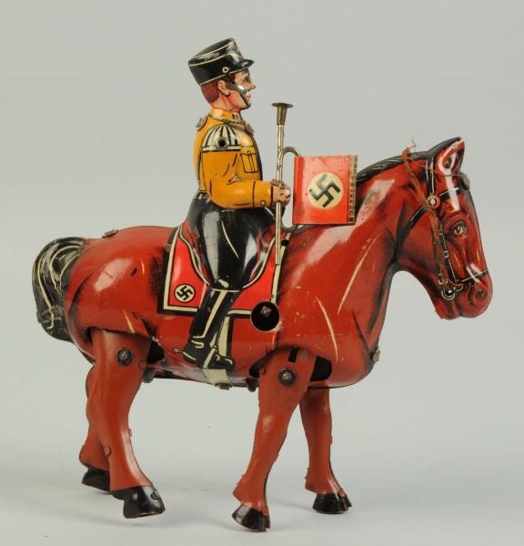 GERMAN TIN LITHO WIND-UP MILITARY FIGURE ON HORSE 