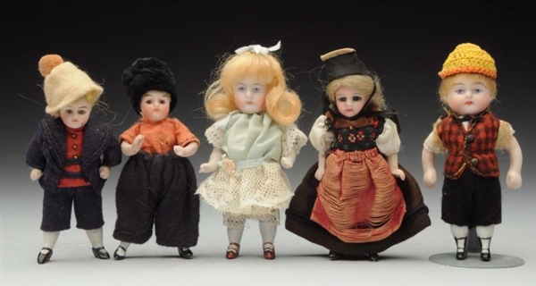 LOT OF 5: ALL-BISQUE DOLLS.                       