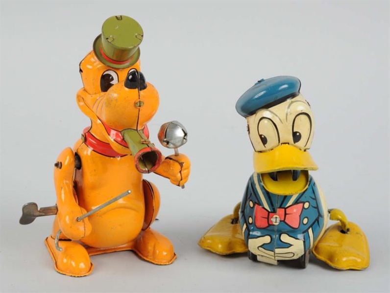 LOT OF 2: TIN WIND-UP PLUTO & DONALD DUCK TOYS.   