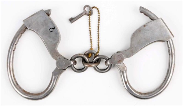 TOWERS DOUBLE LOCK HANDCUFFS.                     