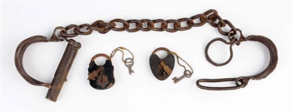 EARLY PUZZLE LOCK LEG IRONS.                      