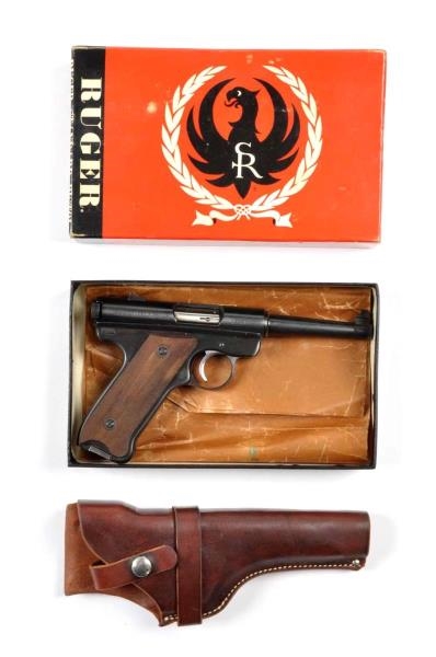 **BOXED RUGER SEMI AUTOMATIC .22 PISTOL.          