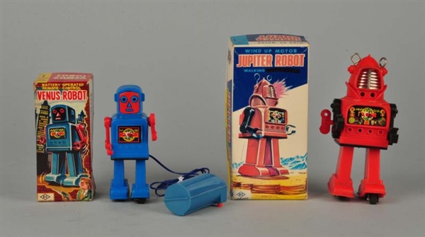 LOT OF 2: PLASTIC ROBOTS IN BOXES.                