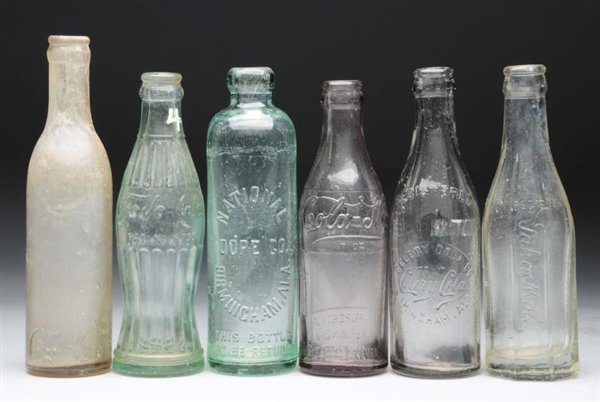 LOT OF 6: ASSORTED GLASS BOTTLES.                 